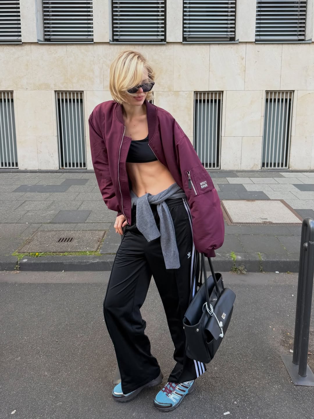 Linda wearing blue trainers