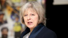 BIRMINGHAM, ENGLAND - OCTOBER 22:Home Secretary Theresa May addresses delegates during the National Black Police Association (NBPA) Conference at Tally Ho Conference Centre on October 22, 201