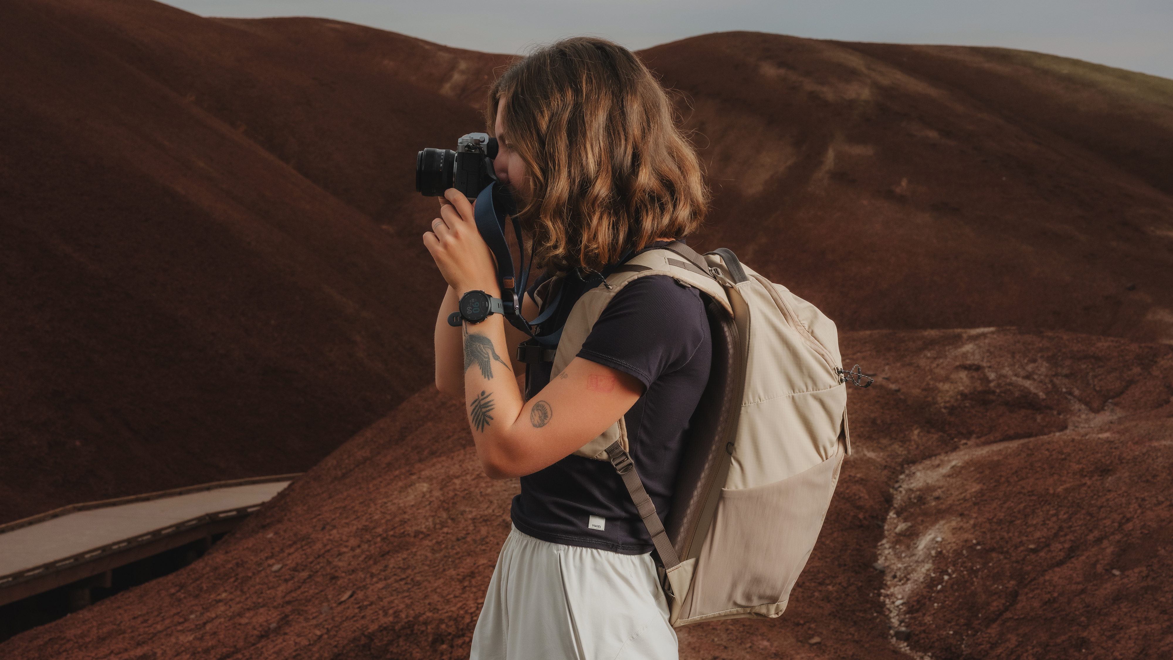 The Moment Sequence backpack being used by a photographer