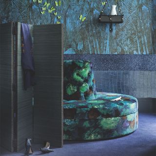 dressing room blue with cushions and thick velvet ottoman