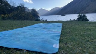Yoga mat with lake in background