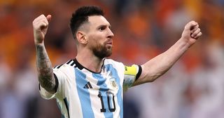 Lionel Messi of Argentina celebrates scoring the team's first penalty in the penalty shoot out during the FIFA World Cup Qatar 2022 quarter final match between Netherlands and Argentina at Lusail Stadium on December 09, 2022 in Lusail City, Qatar.