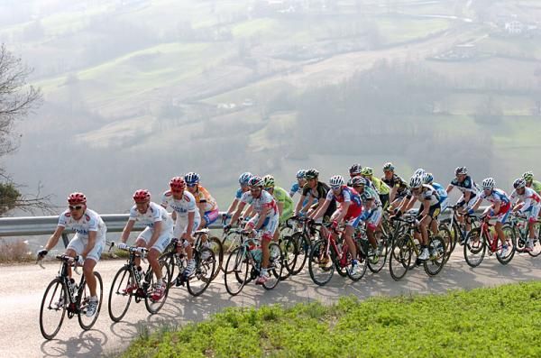 Acqua &amp; Sapone riders set the pace on a climb.