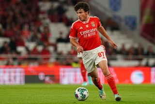 Manchester United target Joao Neves of SL Benfica in action during the Portuguese Cup match between SL Benfica and FC Famalicao at Estadio da Luz on November 25, 2023 in Lisbon, Portugal. (Photo by Gualter Fatia/Getty Images)