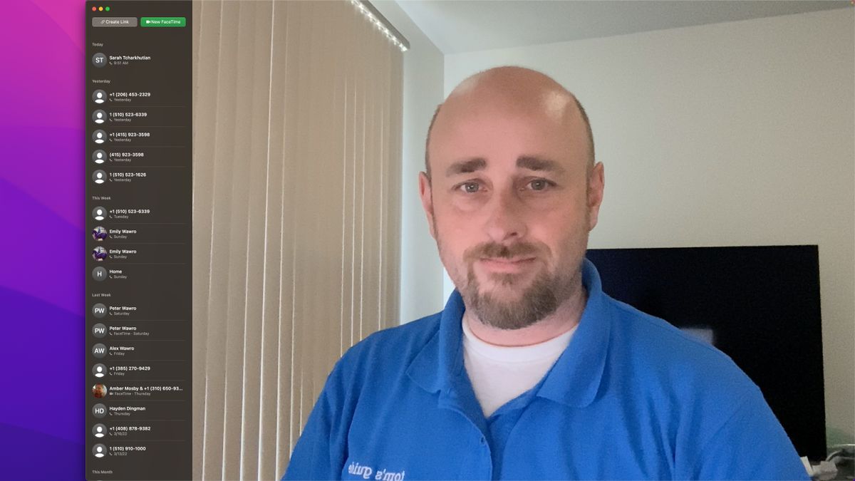 Apple Studio Display in FaceTime, blinds closed