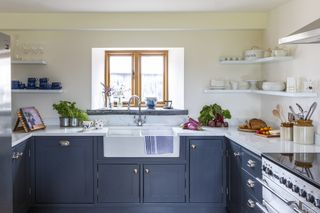 blue kitchen in restored Welsh barn