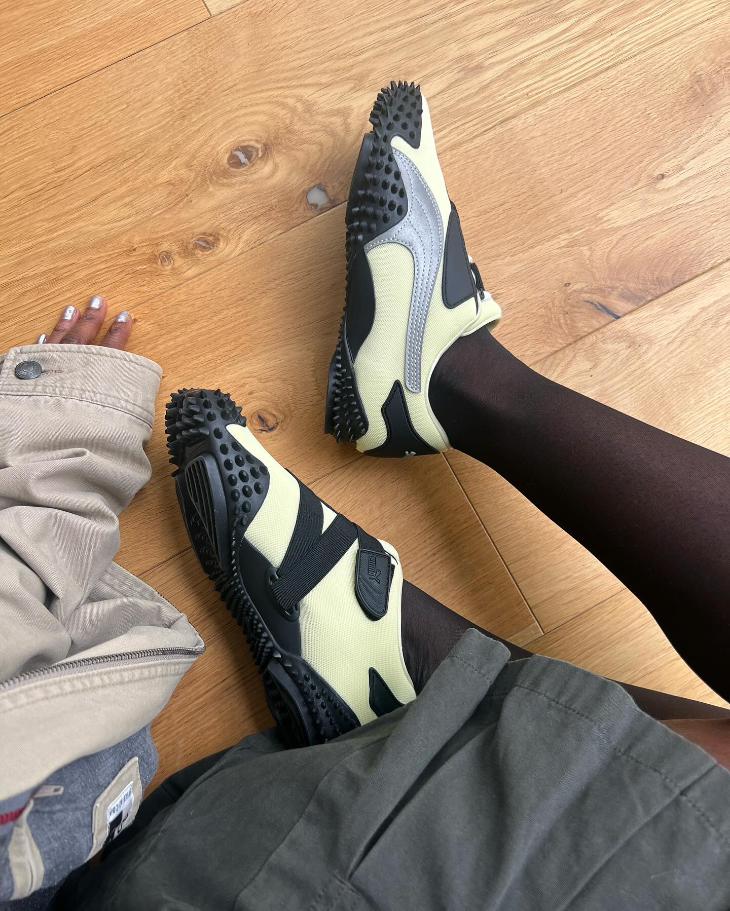 An image of @aude_julie wearing technical trainers, one of the biggest trainer trends of 2026.