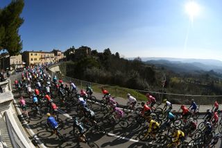TERNI ITALY MARCH 09 A general view of the peloton passing through Ficulle Village 437m during the 57th TirrenoAdriatico 2022 Stage 3 a 170km stage from Murlo to Terni TirrenoAdriatico WorldTour on March 09 2022 in Terni Italy Photo by Tim de WaeleGetty Images