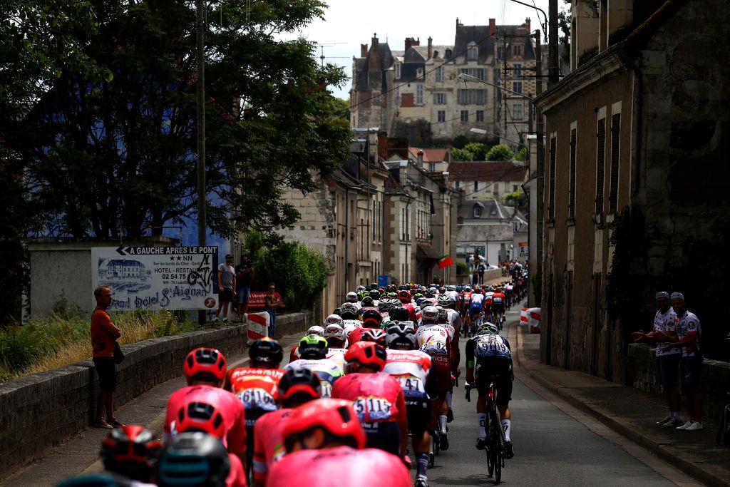 CHATEAUROUX FRANCE JULY 01 The Peloton passing through SaintAignan Village during the 108th Tour de France 2021 Stage 6 a 1606km stage from Tours to Chteauroux Fans Public LeTour TDF2021 on July 01 2021 in Chateauroux France Photo by Chris GraythenGetty Images