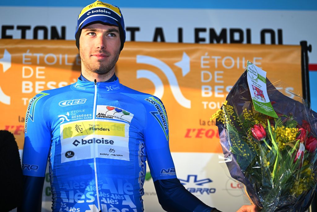 AUBAIS FRANCE FEBRUARY 02 Vito Braet of Belgium and Team Flanders Baloise celebrates at podium as Blue Mountain Jersey winner during the 53rd Etoile de Besseges Tour Du Gard 2023 Stage 2 a 16963km stage from Bagard to Aubais EDB2021 on February 02 2023 in Aubais France Photo by Luc ClaessenGetty Images