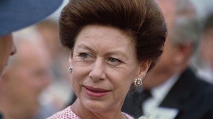 Princess Margaret's go-to dinner party game revealed. Seen here she visits the new Docklands development in London