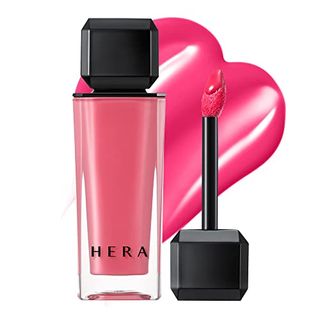 Hera Sensual Nude Gloss in pink beside an applicator with a swatch on a white background