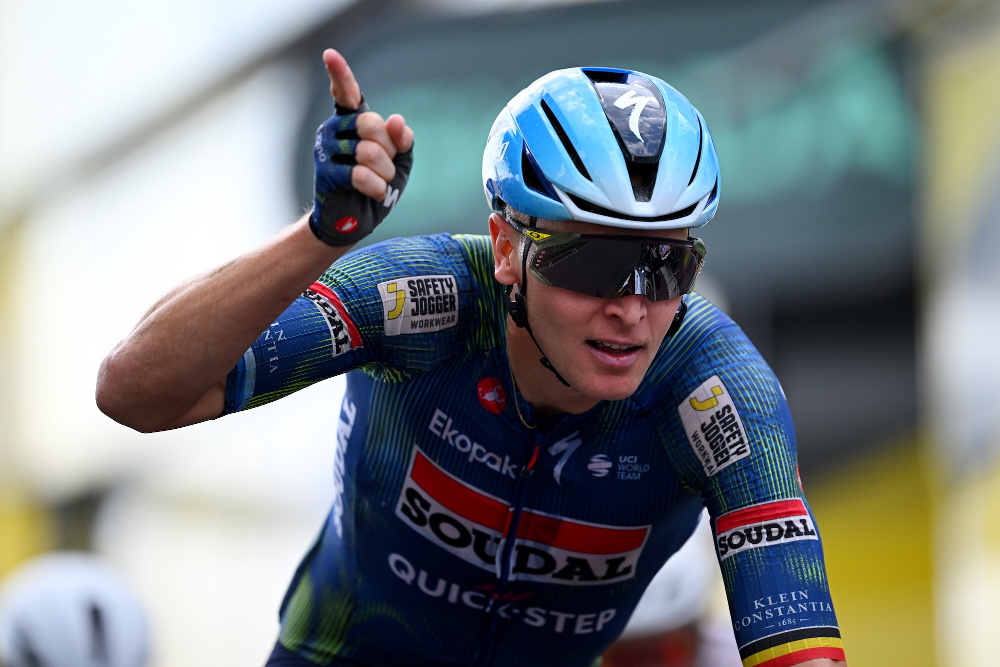 Tim Merlier of Soudal Quick-Step celebrates at finish line as stage 12 winner