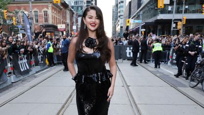 Selena Gomez attends the Toronto International Film Festival premiere of Emilia Perez wearing a sequin dress by Rodarte that includes the rosette trend