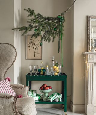 Christmas living room, green drinks trolley, foliage suspended above