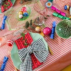 Brightly coloured Christmas tablescape using secondhand finds. 