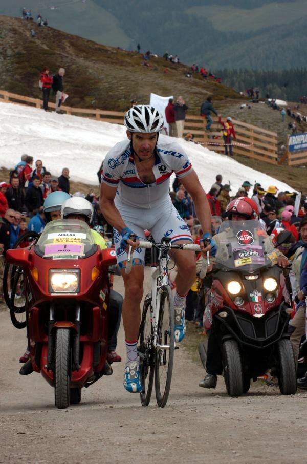 The guys to David Millar's left have the right idea: a three wheeled motorcycle on Plan de Corones in 2008.