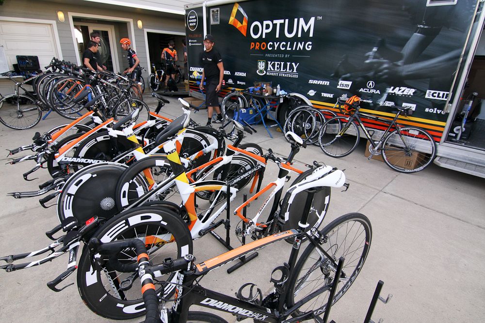 Mechanics assemble the team's time trial machines.