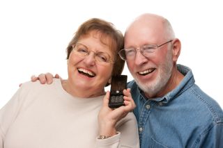Senior couple with older phone