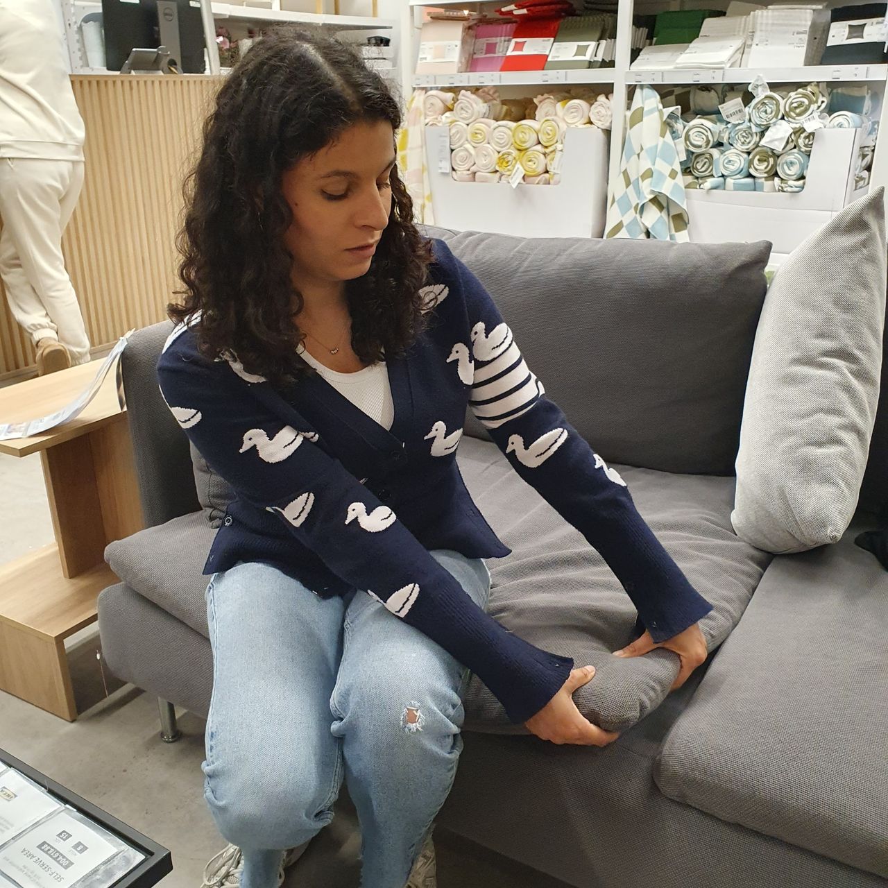 Ideal Home's Content Editor, Sara Hesikova testing a modular sofa