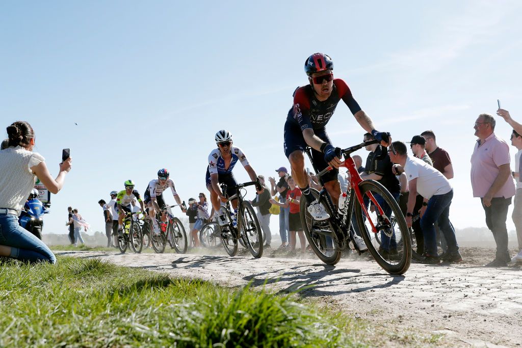 ROUBAIX FRANCE APRIL 17 LR Yves Lampaert of Belgium and Team QuickStep Alpha Vinyl and Dylan Van Baarle of Netherlands and Team INEOS Grenadiers compete passing through a cobblestones sector during the 119th ParisRoubaix 2022 Mens Elite a 2572km one day race from Compigne to Roubaix ParisRoubaix WorldTour on April 17 2022 in Roubaix France Photo by Bas CzerwinskiGetty Images