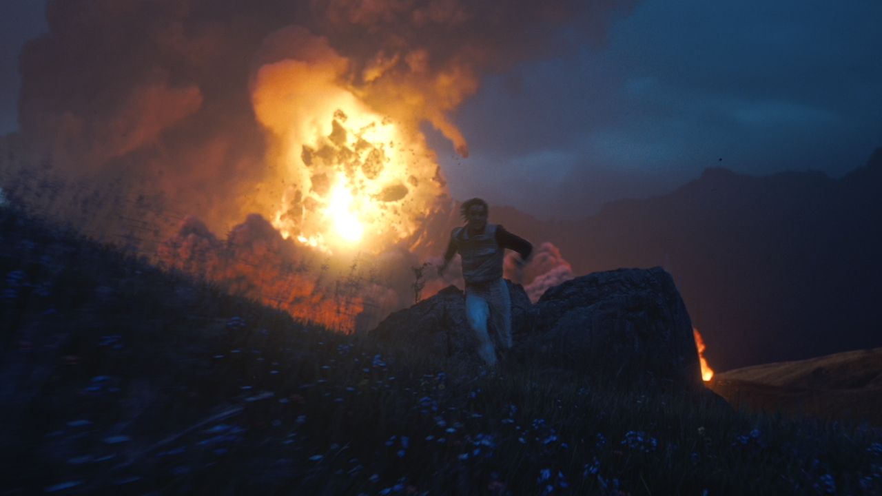 Haymitch running from fire in The Hunger Games: Sunrise on the Reaping