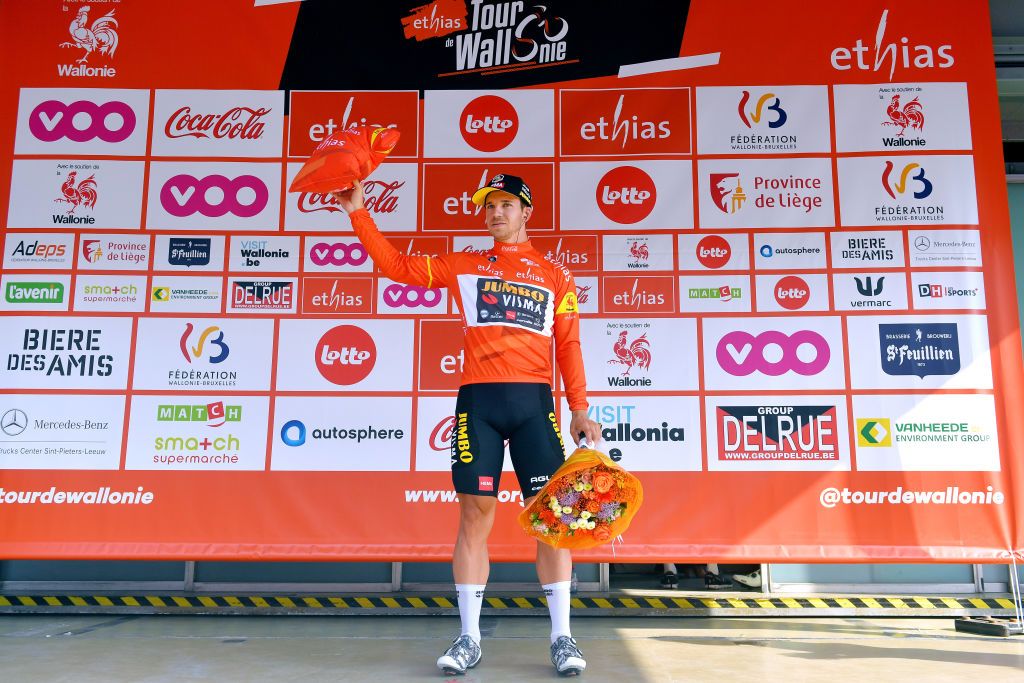 HEUSDENZOLDER BELGIUM JULY 21 Dylan Groenewegen of Netherlands and Team Jumbo Visma Orange Leader Jersey celebrates at podium during the 42nd Tour de Wallonie 2021 Stage 2 a 120km stage from Zolder Circuit to Zolder Circuit Race held at the Zolder Circuit due to flooding in the country tourdewallonie grandprixdewallonie on July 21 2021 in HeusdenZolder Belgium Photo by Luc ClaessenGetty Images