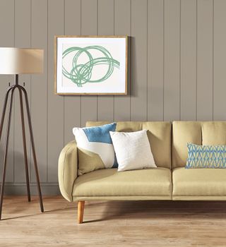 Rustic Greige surrounding a yellow sofa and artwork in a living room