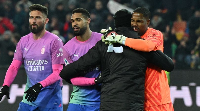 AC Milan goalkeeper Mike Maignan embraced by team-mates at the end of his club&#039;s 3-2 win at Udinese, in which he received racial abuse, in January 2024.