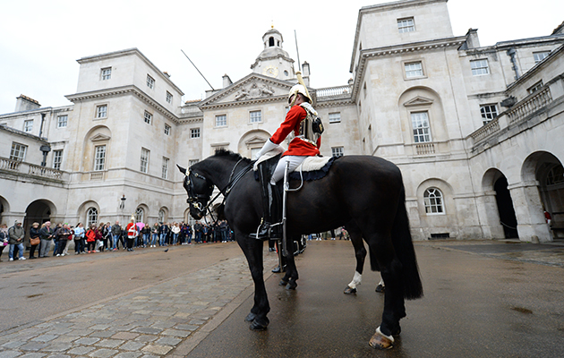 Camera ready: tourists gather round to get a glimpse of this iconic tradition