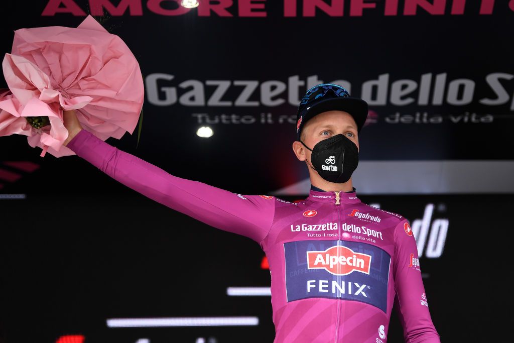 GUARDIA SANFRAMONDI ITALY MAY 15 Tim Merlier of Belgium and Team AlpecinFenix Purple Points Jersey celebrates at podium during the 104th Giro dItalia 2021 Stage 8 a 170km stage from Foggia to Guardia Sanframondi 455m girodiitalia Giro UCIworldtour on May 15 2021 in Guardia Sanframondi Italy Photo by Tim de WaeleGetty Images