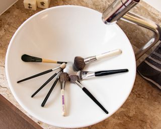 Makeup brushes in sink