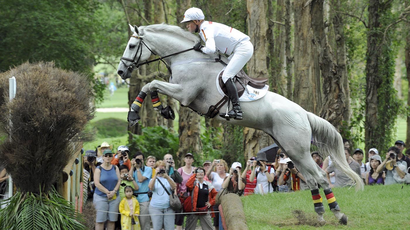 German eventing rider Hinrich Romeike compets on his horse Marius in the eventing cross country run at the equestrian arena of the Beijing 2008 Olympic Games in Hong Kong, China, 11 August 2008. JOCHEN LUEBKE |