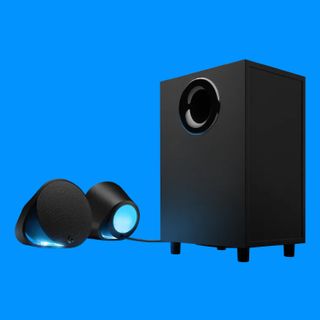 The Logitech G560 2.1 speakers on a blue background