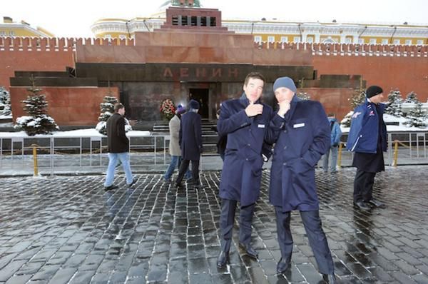 Two riders pose in Red Square