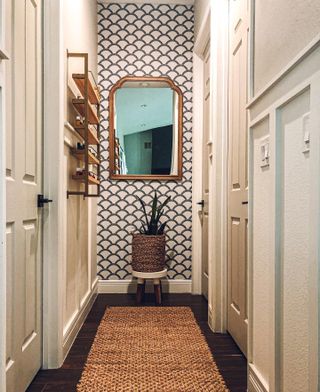 Scallop peel and stick wallpaper in a hallway