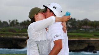 Joel Dahmen embraces wife Lona following the Corales Puntacana Championship