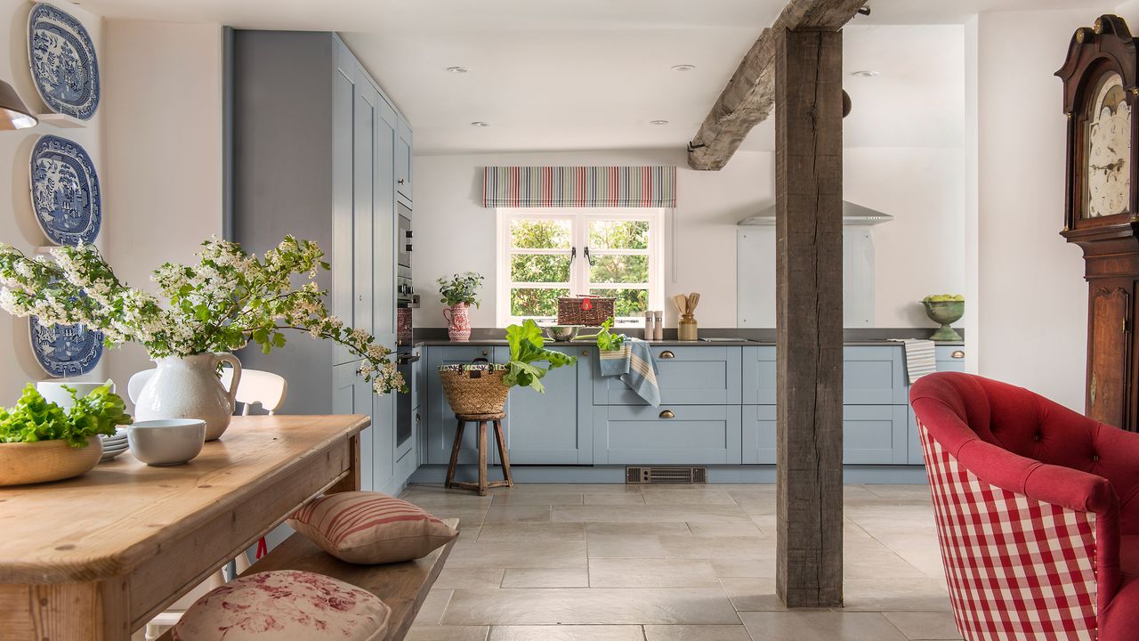 open plan kitchen diner in a cottage with original beams