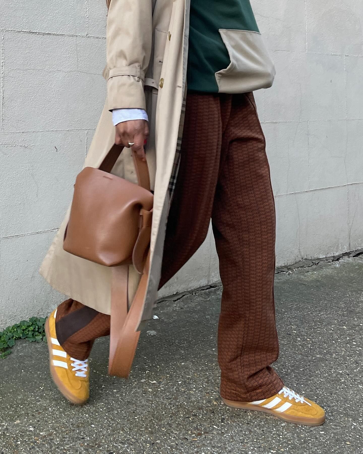 Seun wears yellow Adidas Gazelles