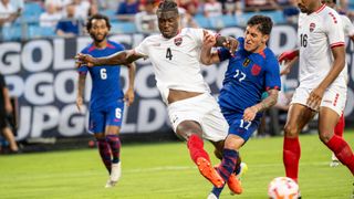 Two players come together ahead of the USA vs Trinidad and Tobago live stream