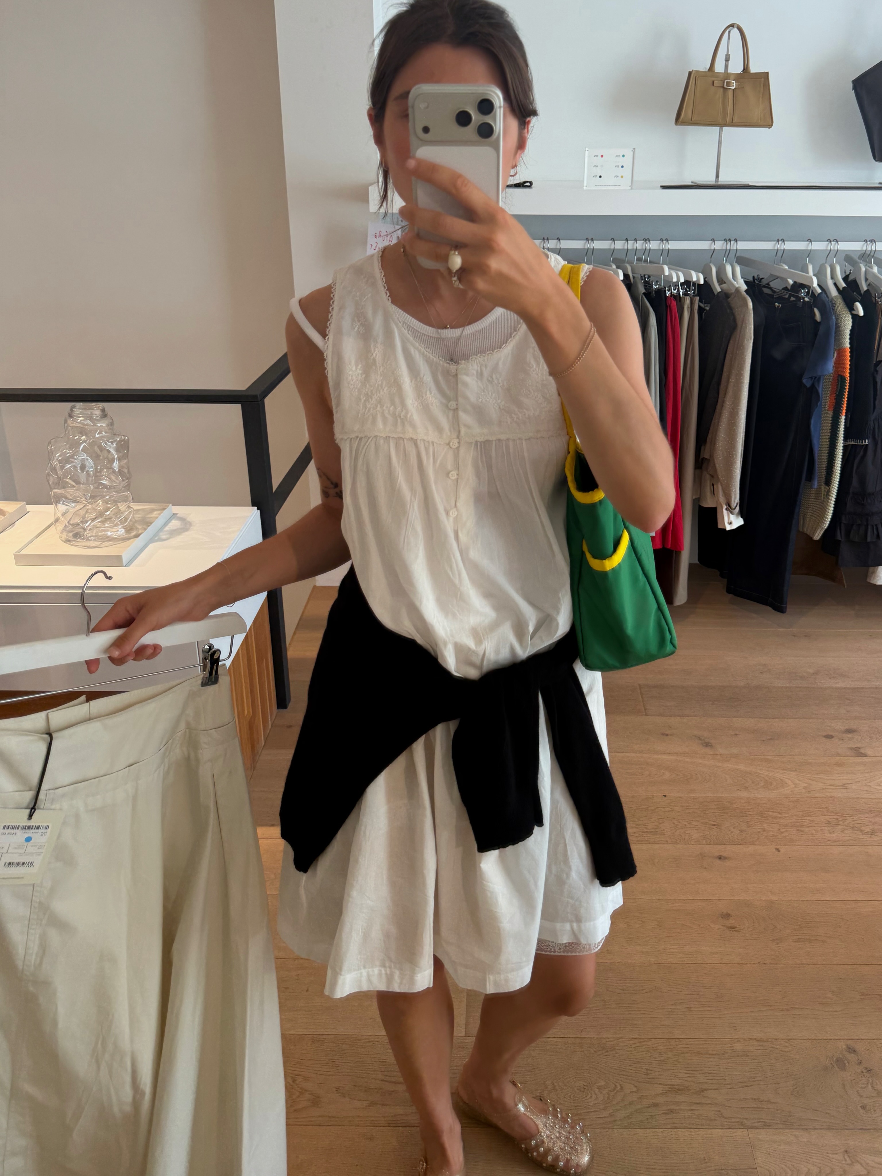 Poppy Almond wearing a sleep-dress and jelly flats.