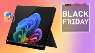 A Microsoft Surface Pro 2-in-1 on a colorful gradient background, with the badge "Tom's Hardware Black Friday" to its side.