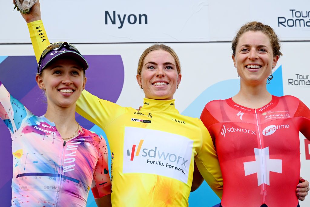 NYON SWITZERLAND SEPTEMBER 17 LR Katarzyna Niewiadoma of Poland and CanyonSRAM Racing Team on second place race winner Demi Vollering of The Netherlands and Team SD Worx Yellow Leader Jersey and Marlen Reusser of Switzerland and Team SD Worx on third place pose on the podium ceremony after the 2nd Tour de Romandie Feminin 2023 Stage 3 a 1108km stage from Vernier to Nyon UCIWWT on September 17 2023 in Nyon Switzerland Photo by Dario BelingheriGetty Images