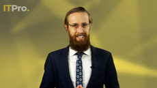 Presenter Ant Joblin on a yellow background talking to the camera