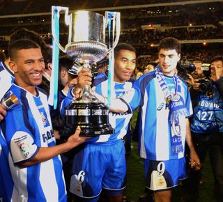 Deportivo La Coruña players celebrate after winning the Copa del Rey final against Real Madrid at the Santiago Bernabéu in March 2002.