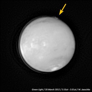 Caption: An image captured by amateur astronomer W. Jaeschke in 2012 revealed a mysterious plumelike feature (marked with yellow arrow) at the limb of the Red Planet. The image is shown with the North Pole toward the bottom and the South Pole to the top.