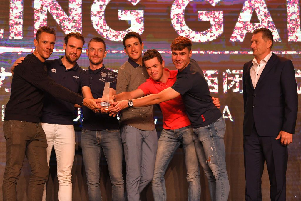 The Quick-Step Floors team celebrate winning the WorldTour