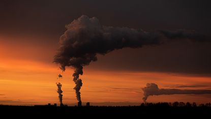 Smoke rises from two coal-fired power stations in Ober Prauske, Germany