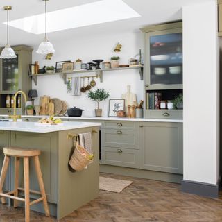 green kitchen cabinets with country styling