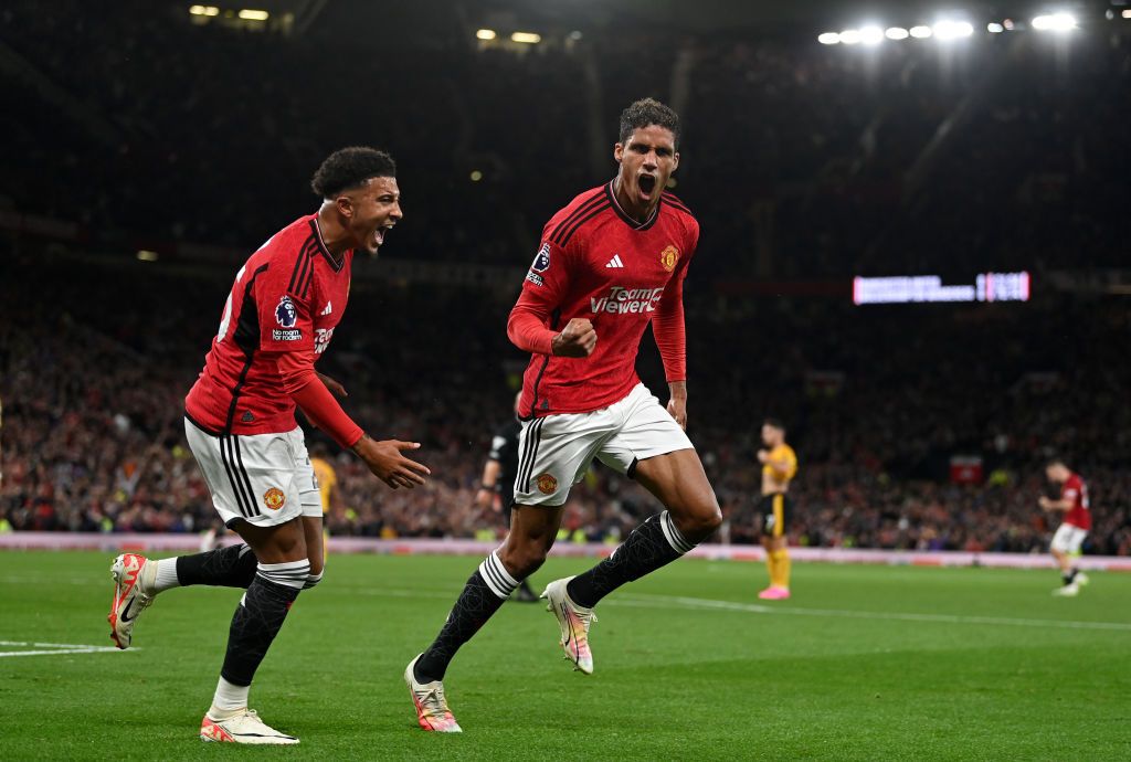 Tottenham vs Manchester United live stream Raphael Varane of Manchester United celebrates with Jadon Sancho after scoring the team&#039;s first goal during the Premier League match between Manchester United and Wolverhampton Wanderers at Old Trafford on August 14, 2023 in Manchester, England. (Photo by Gareth Copley/Getty Images)